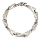 EDVARD KINDT-LARSEN FOR GEORG JENSEN - A DANISH SILVER BUTTERFLY BRACELET, 104A