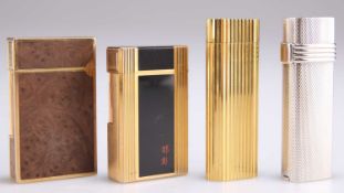 A GROUP OF FOUR LIGHTERS