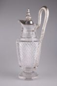 AN EARLY VICTORIAN SILVER-MOUNTED CLARET JUG