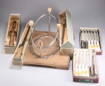 TWO SETS OF HARRODS TABLE KNIVES, AND A FORTNUM & MASON CARVING SET