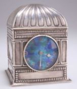 AN ARTS AND CRAFTS SILVER AND ENAMEL MANTEL CLOCK