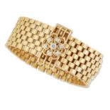 AN 18 CARAT GOLD DIAMOND BUCKLE BRACELET, CIRCA 1970S