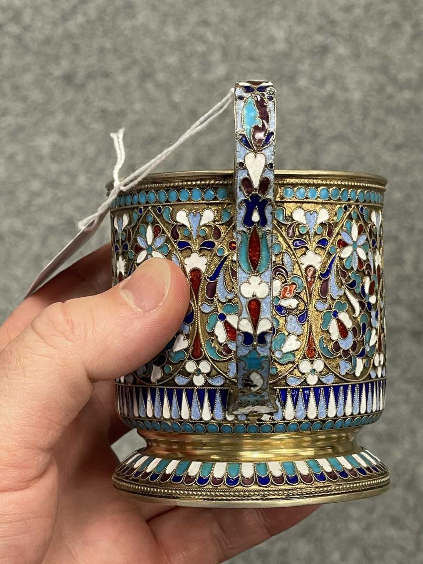 A RUSSIAN SILVER-GILT AND ENAMEL MUG AND SPOON - Image 10 of 12