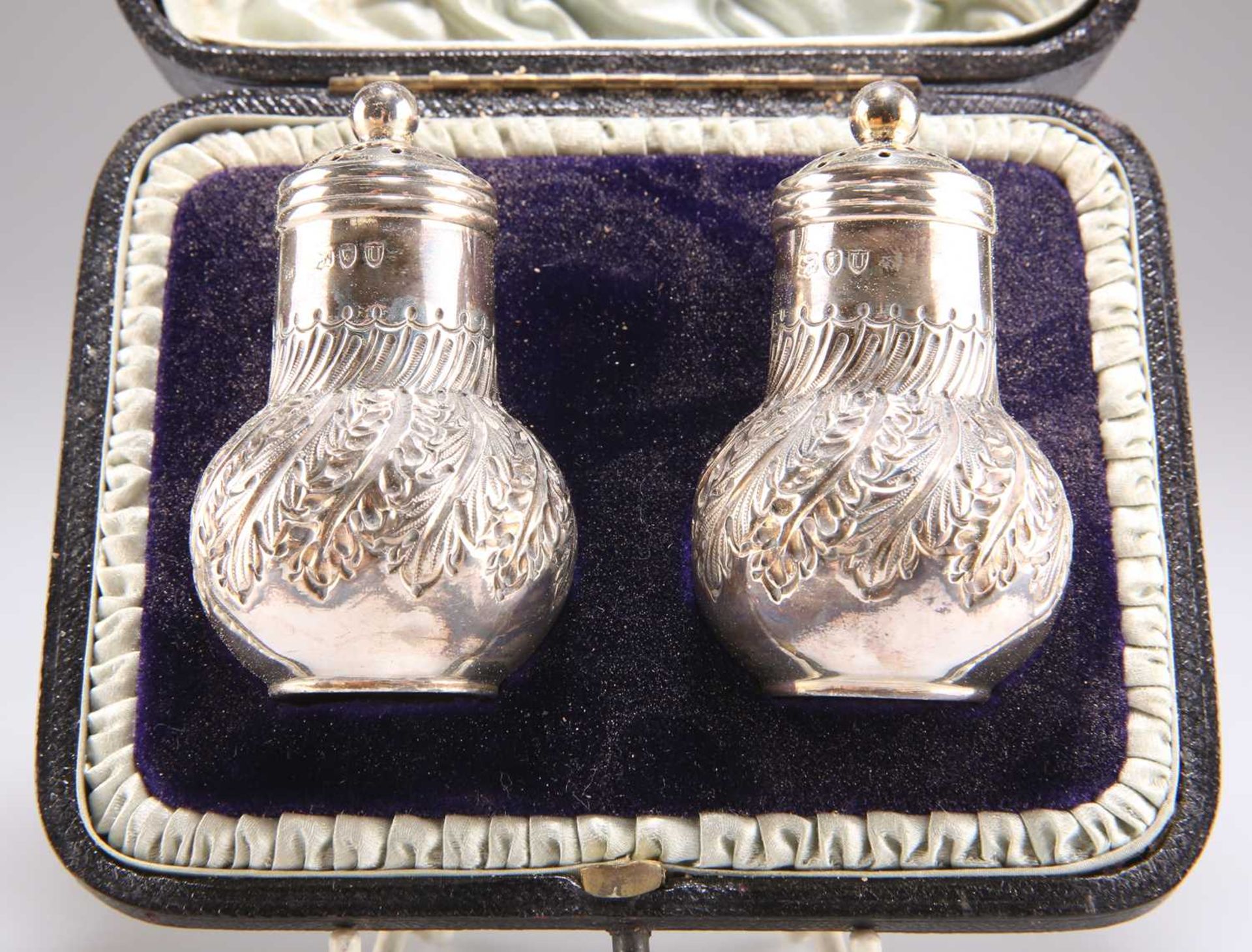 A PAIR OF VICTORIAN SILVER PEPPER POTS