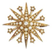 A LATE 19TH CENTURY DIAMOND AND SEED PEARL STAR BROOCH