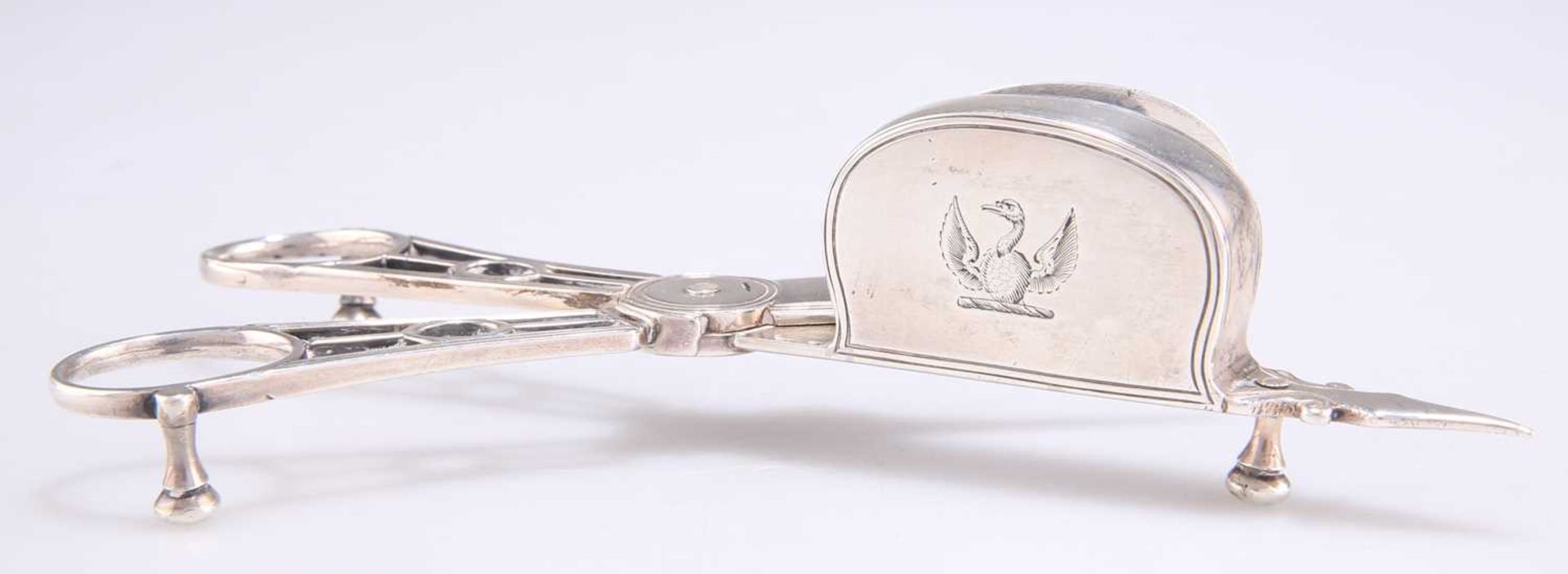 A PAIR OF GEORGE III SILVER CANDLE SNUFFERS