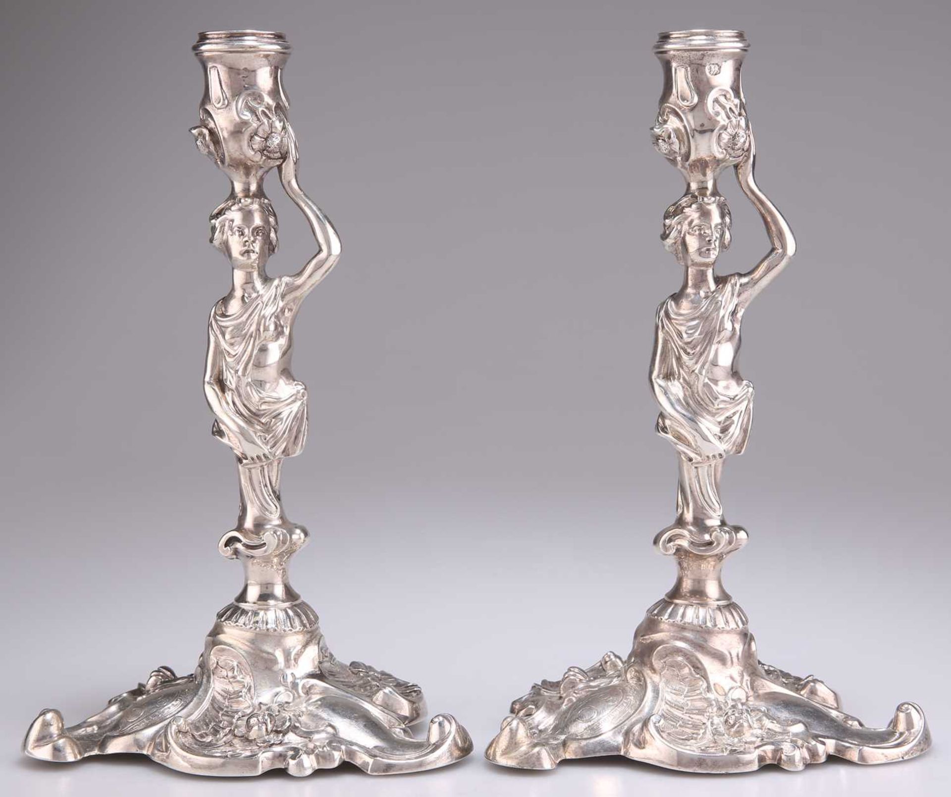 A FINE PAIR OF GEORGE II CAST SILVER CANDLESTICKS