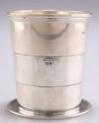 A GEORGE VI SILVER COLLAPSIBLE BEAKER