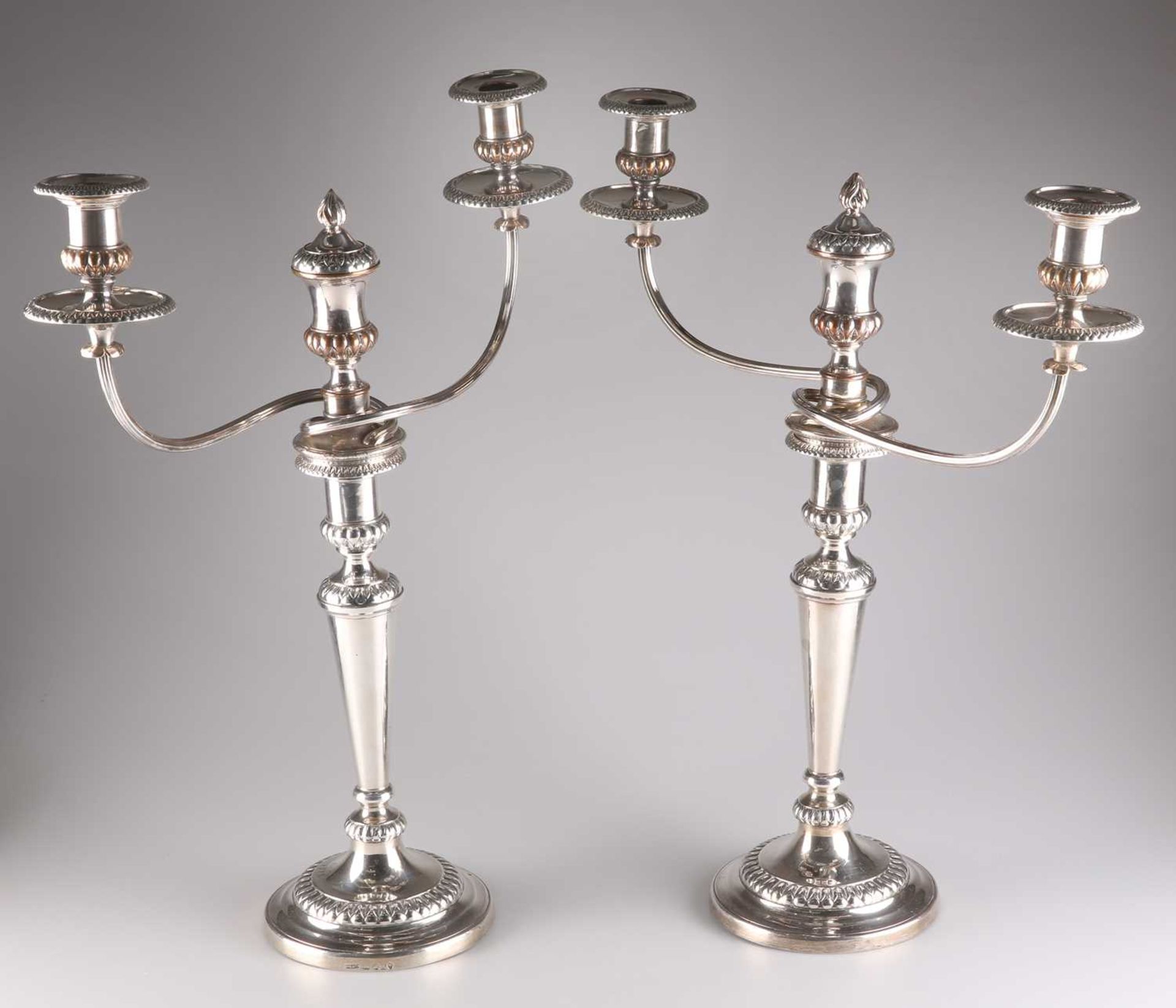 A PAIR OF GEORGE III SILVER AND OLD SHEFFIELD PLATE CANDELABRA