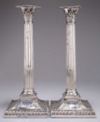 A LARGE PAIR OF GEORGE III SILVER CANDLESTICKS