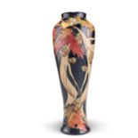 A MOORCROFT LIMITED EDITION WOOD NYMPH PATTERN TUBE LINED POTTERY VASE