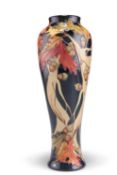 A MOORCROFT LIMITED EDITION WOOD NYMPH PATTERN TUBE LINED POTTERY VASE