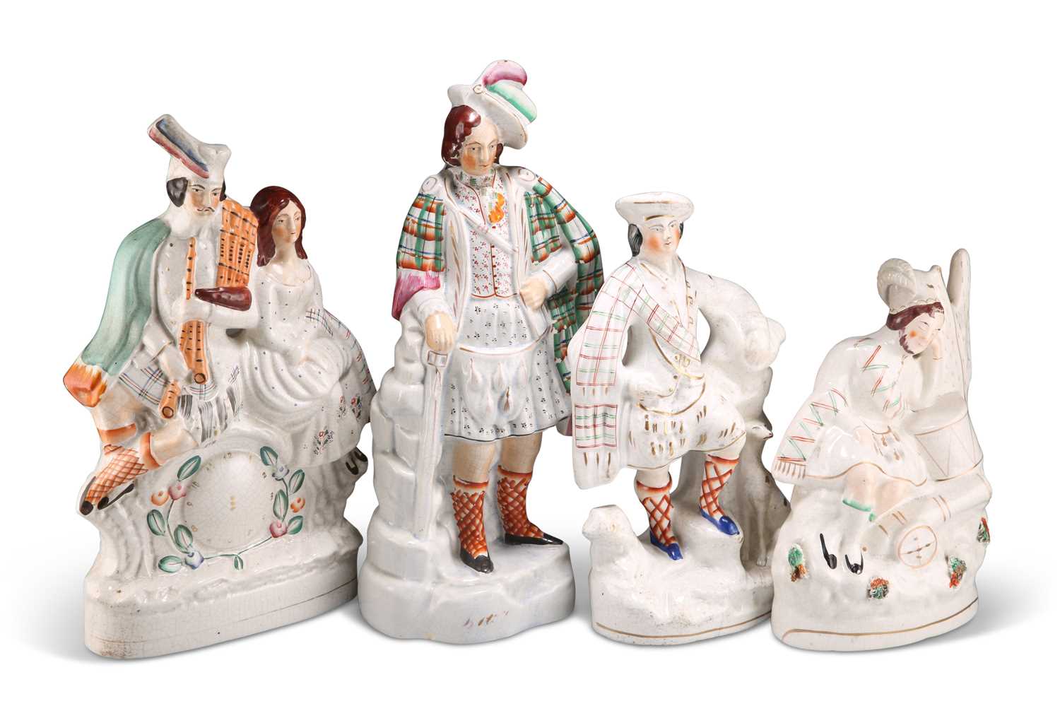 A GROUP OF FOUR VICTORIAN STAFFORDSHIRE FLAT-BACK FIGURES