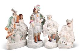 A GROUP OF FOUR VICTORIAN STAFFORDSHIRE FLAT-BACK FIGURES