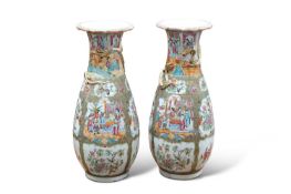 A LARGE PAIR OF 19TH CENTURY CANTONESE FAMILLE ROSE VASES