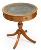 A REGENCY STYLE LEATHER INSET AND INLAID MAHOGANY DRUM TABLE