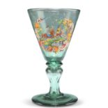 A 19TH CENTURY BOHEMIAN GREEN GLASS WINE