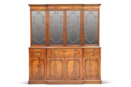A BEVAN-FUNNELL REPRODUX MAHOGANY BREAKFRONT BOOKCASE, IN GEORGE III STYLE