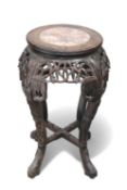 A CHINESE MARBLE-INSET HARDWOOD PLANT STAND, CIRCA 1900,