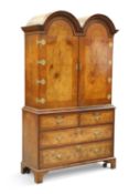AN 18TH CENTURY STYLE BURR WALNUT DOUBLE DOME TOPPED CABINET ON CHEST, EARLY 20TH CENTURY