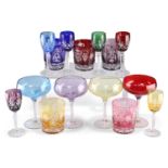 A COLLECTION OF FIFTEEN COLOURED DRINKING GLASSES