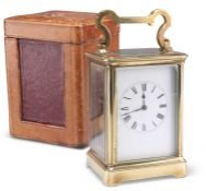 AN EARLY 20TH CENTURY BRASS STRIKING CARRIAGE CLOCK