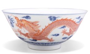 A CHINESE UNDERGLAZE BLUE AND IRON RED DECORATED 'DRAGON' BOWL