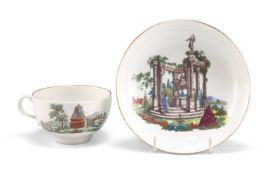 A WORCESTER PORCELAIN 'EUROPEAN RUINS' TEACUP AND SAUCER, CIRCA 1765