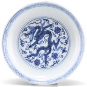 A CHINESE BLUE AND WHITE 'DRAGON' DISH