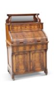 A CONTINENTAL MAHOGANY TAMBOUR DESK, 19TH CENTURY