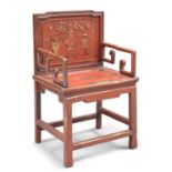 A CHINESE RED LACQUERED ELM CHAIR