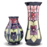 TWO MOORCROFT VIOLET PATTERN TUBE LINED POTTERY VASES