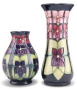 TWO MOORCROFT VIOLET PATTERN TUBE LINED POTTERY VASES