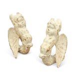 A PAIR OF PAINTED CAST IRON WINGED CHERUBS