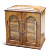 A VICTORIAN WALNUT TABLE CABINET