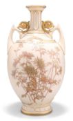 A ROYAL WORCESTER BLUSH IVORY TWO-HANDLED VASE