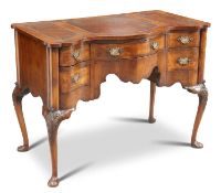 A QUEEN ANNE STYLE WALNUT SERPENTINE DESK