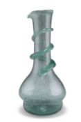 A LIGHT GREEN GLASS CARAFE, LATE 19TH CENTURY