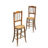 A PAIR OF 19TH CENTURY FAUX ROSEWOOD CORRECTION CHAIRS