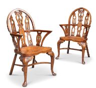 A PAIR OF GOTHIC STYLE HARDWOOD WINDSOR ARMCHAIRS