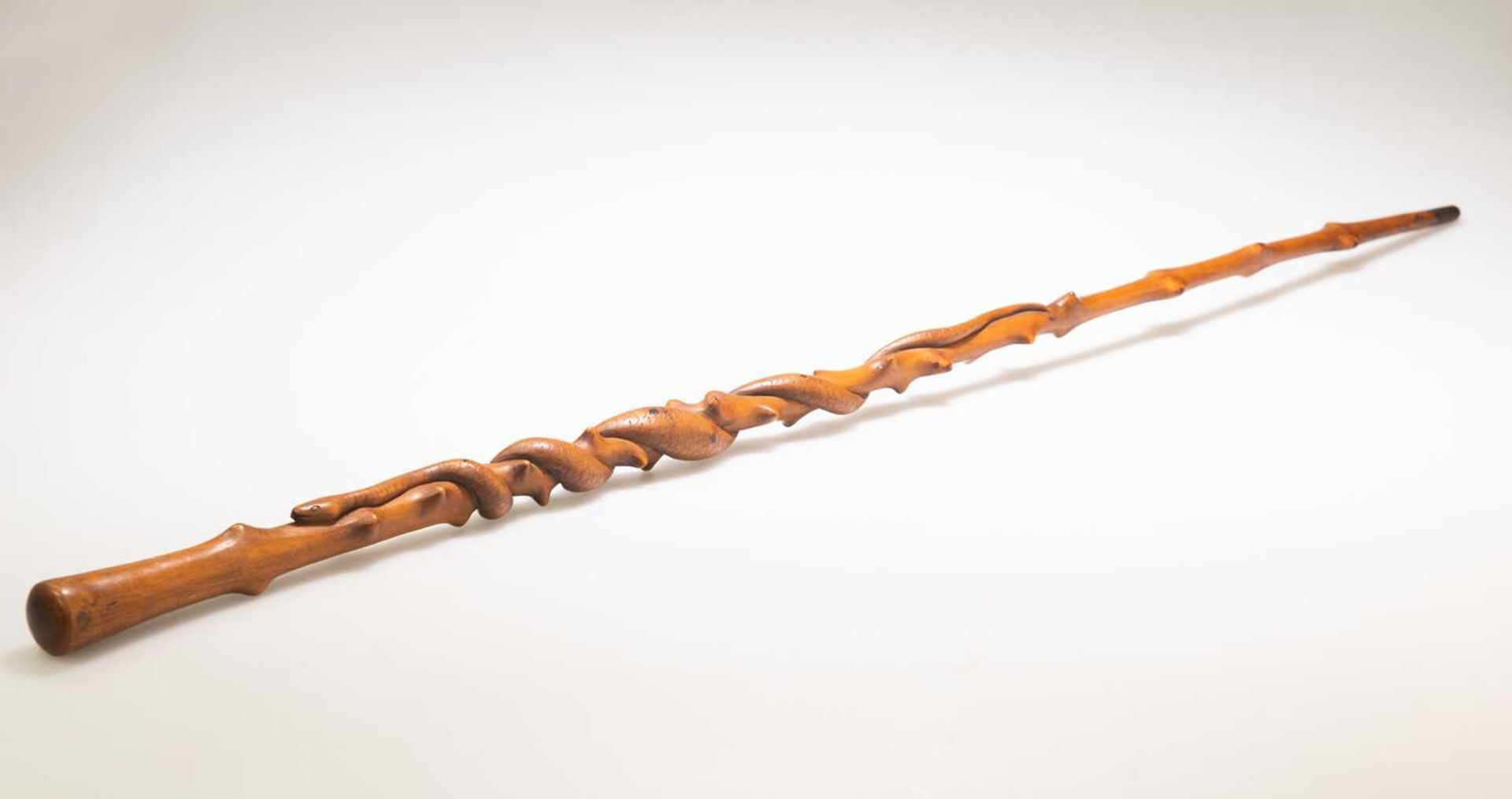 A 19TH CENTURY CARVED WALKING STICK