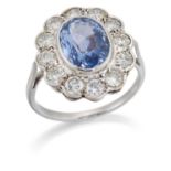 A SAPPHIRE AND DIAMOND CLUSTER RING