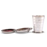 AN EARLY 20TH CENTURY SILVER-PLATED COLLAPSIBLE TRAVEL BEAKER IN FOB CASE