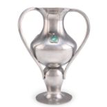 AN ART NOUVEAU PEWTER VASE