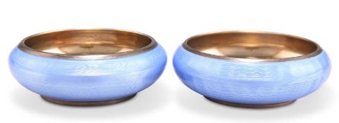 A PAIR OF EARLY 20TH CENTURY NORWEGIAN SILVER GILT AND POWDER BLUE GUILLOCHE ENAMEL OPEN SALTS