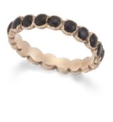 AN EARLY 19TH CENTURY ONYX ETERNITY RING
