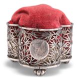 A CHINESE SILVER PIN-CUSHION