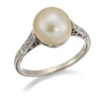 A NATURAL SALTWATER PEARL AND DIAMOND RING