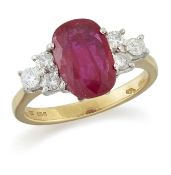 AN 18 CARAT GOLD RUBY AND DIAMOND RING