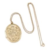A 9 CARAT GOLD OVAL LOCKET PENDANT ON CHAIN